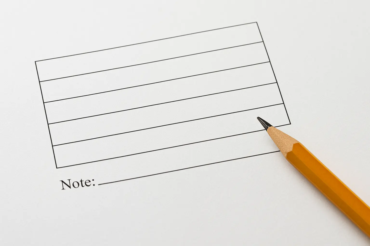 Academic table with horizontal rules only and an explanatory note beneath